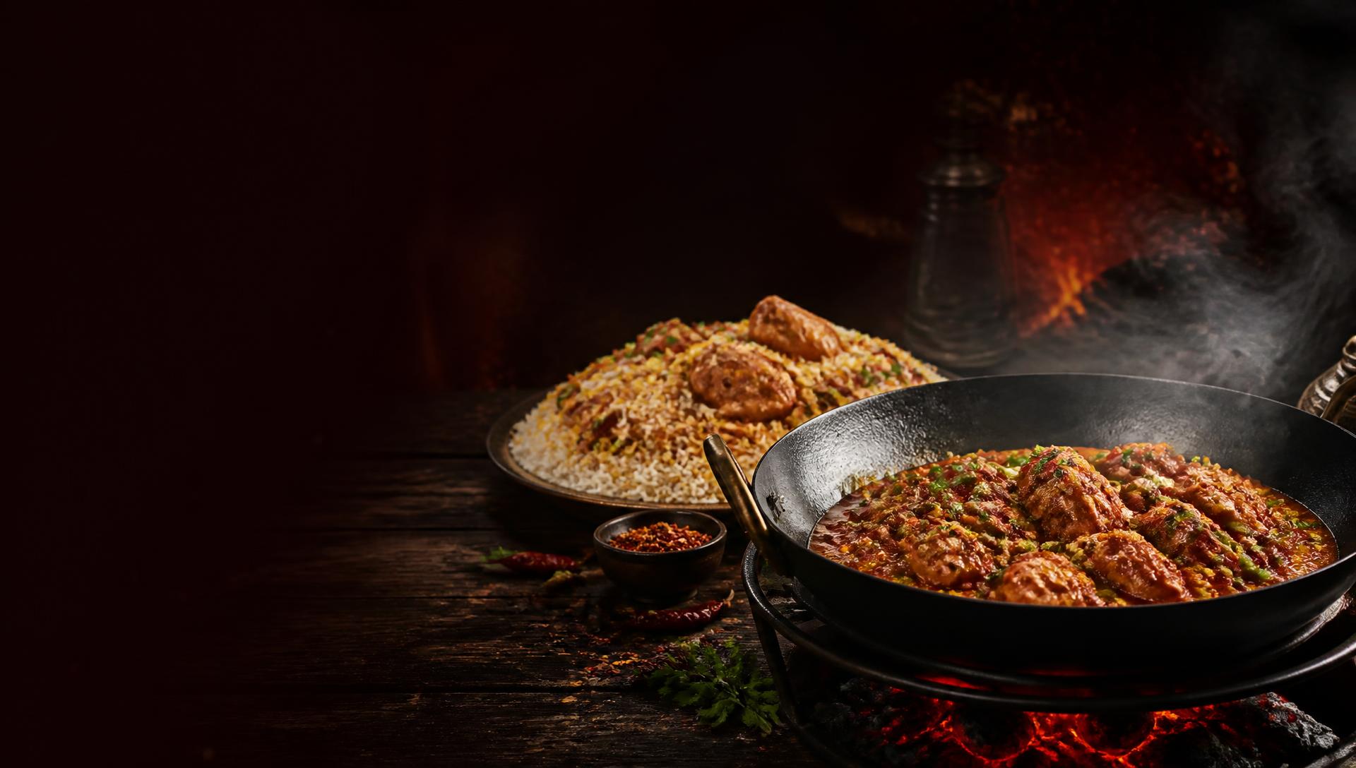 Sizzling desi karahi and biryani at Zaiqa Restaurant